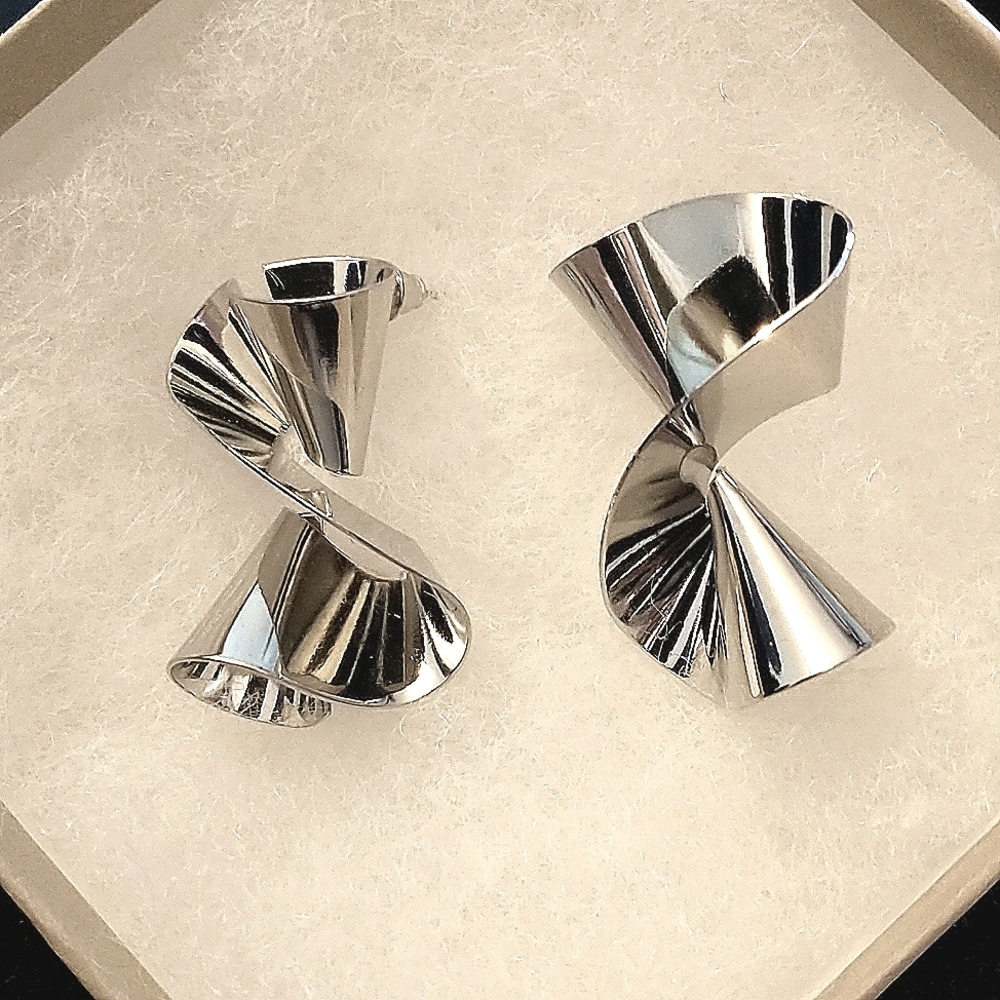 "Twisted Sister" Silver tone earrings by Natural Girls Rock